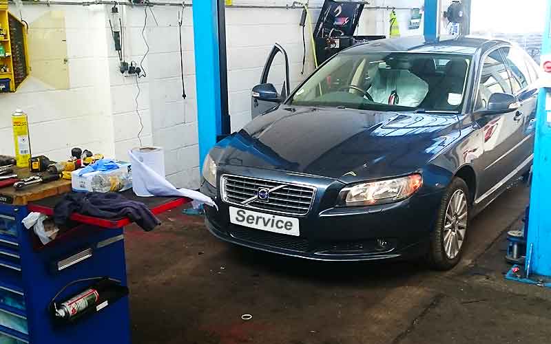 older volvo in excels volvo garage being checked for faults and problems