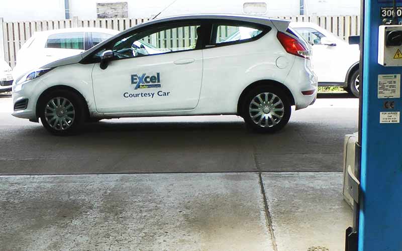 excels white for fiesta loan car photographed outside reception